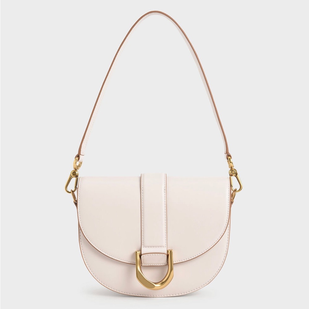 Charles & Keith | Gabine Leather Saddle Bag (Pink)